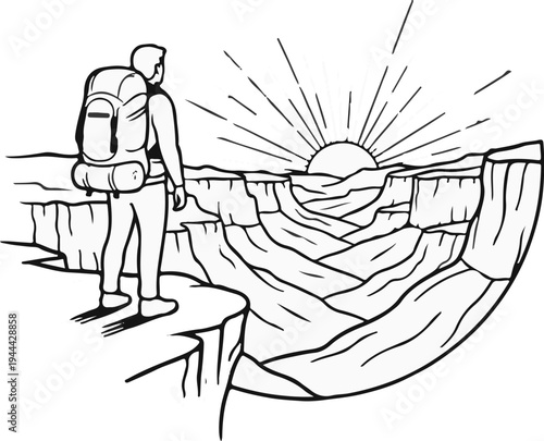 Hiker at sunrise overlooks vast canyon