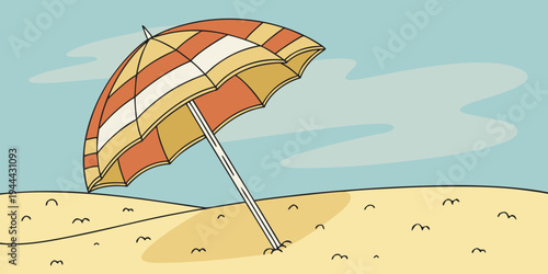 Beach umbrella on sandy shore with blue sky