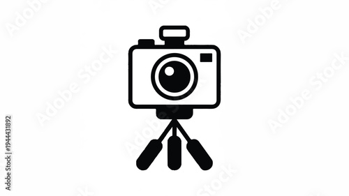 Simple black and white illustration of a camera on a tripod