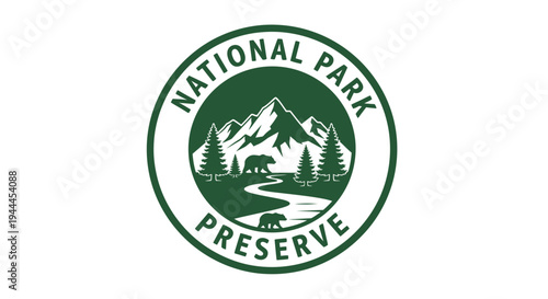 A circular green and white logo for a national park preserve, featuring mountains, pine trees, a winding river, and two bears, symbolizing nature conservation.