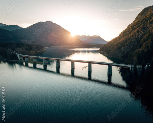 Spectacular Drone View of Sylvenstein Dam and Faller Klamm Bridge, Aerial Autumn Landscape of the Bavarian Alps with Turquoise Water
