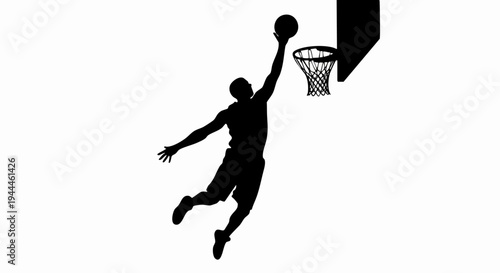 Basketball Player in Mid-Air Dunk.