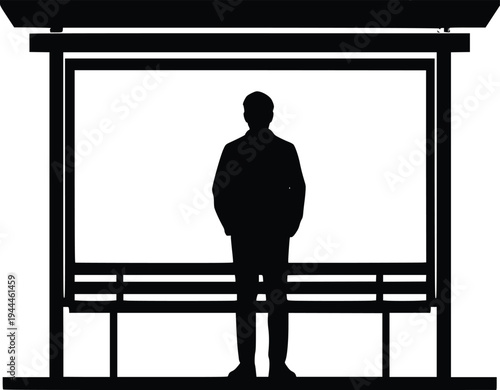 Silhouette of a person standing in front of a blank screen or projection area
