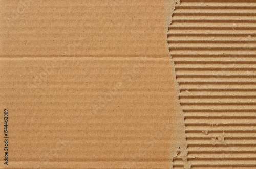 Brown cardboard sheet abstract background, texture of recycle paper box in old vintage pattern with ripped edges.