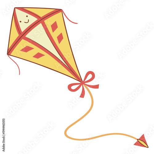 A yellow kite with a smiling face and red details