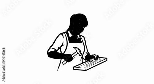 Person in apron hammering nails into a wooden plank