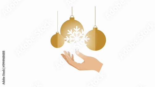 A hand offers a snowflake to festive golden ornaments hanging above