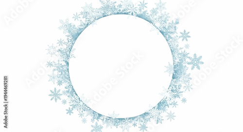 A circular frame made of delicate blue and white snowflakes on a white background