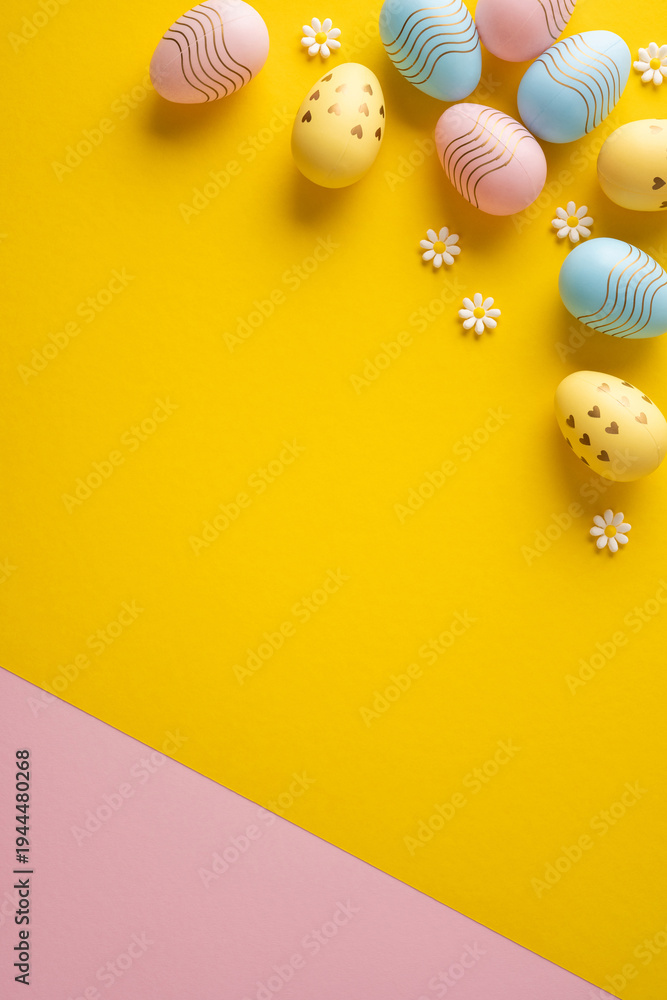 Naklejka premium Happy Easter vertical pastel eggs arranged with small daisy flowers on a vibrant yellow and pink background conveying spring joy and festive decoration for seasonal cards and social posts