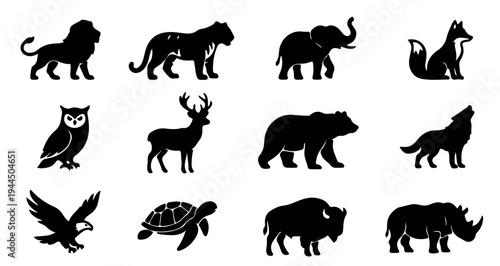 Collection of twelve black animal silhouettes including lion, tiger, elephant, fox, owl, deer, bear, wolf, eagle, turtle, bison, and rhinoceros.