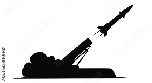 Silhouetted missile launching from a mobile launcher depicting military technology