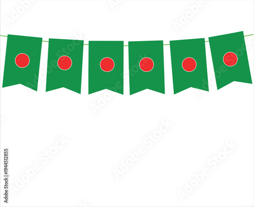 String of green flags with red and white circular emblems hanging in a row