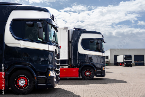 Canvastavla Modern blue cargo truck delivery van parked logistics warehouse center complex building exterior bay