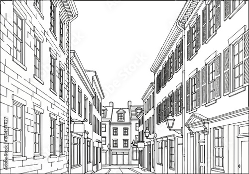 Narrow cobblestone street lined with historic buildings and shuttered windows