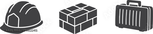 Black and white of hard hat bricks and briefcase construction