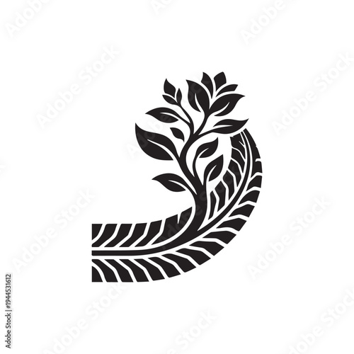 Growing Plant Emerging From Tire Tread - Eco-Friendly Concept.