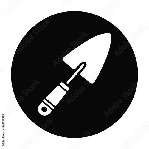 Vector of a white trowel inside a black circle