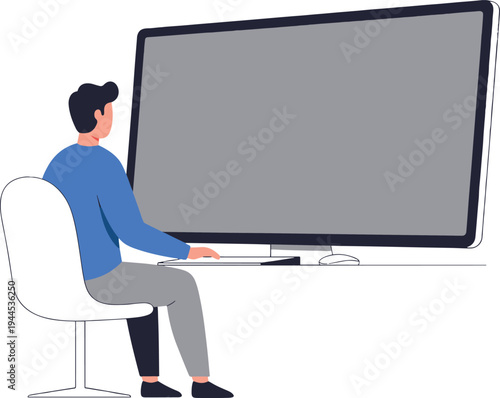 Man sitting in front of a large computer monitor