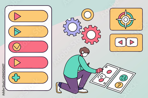 Man kneeling and adjusting a control panel with gears and buttons green shirt