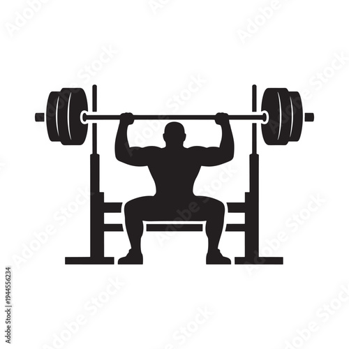 Silhouette of a weightlifter performing a barbell squat in a gym