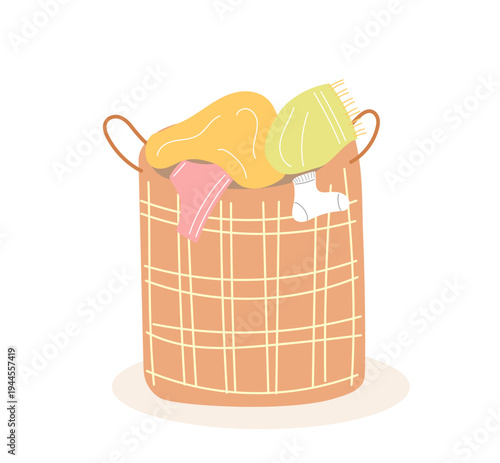 Flat vector illustration of a wicker laundry basket filled with clothes isolated on white background.