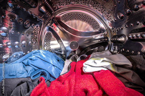 Washing machine drum with colorful clothes