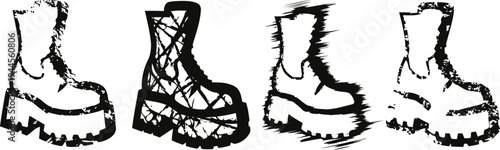 close up of a pair of black chunky platform boots on a white background