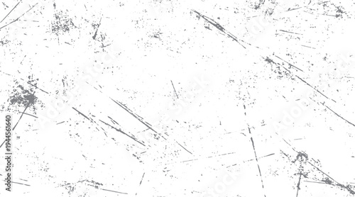 Gray grunge texture with scratches and speckles on white background. distressed overlay pattern. abstract weathered surface
