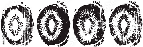 four rustic black and white tree trunk cross sections with visible growth rings and textured bark