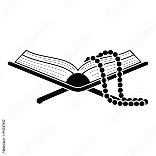 Open holy book with prayer beads, islamic symbol