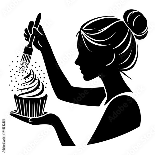 Woman decorating cupcake with sprinkles