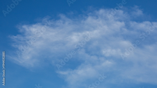 Wispy Clouds in a Blue Sky