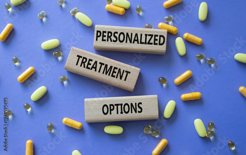Personalized treatment options symbol. Concept words Personalized treatment options on wooden blocks. Beautiful purple background with pills. Healthcare concept. Copy space.