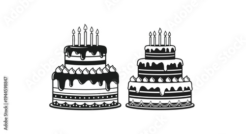 Two tiered birthday cakes with lit candles in black and white