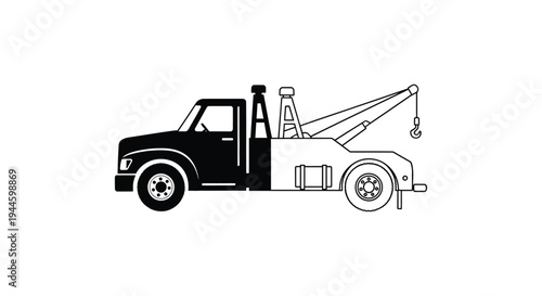 A black and white illustration of a tow truck in profile view