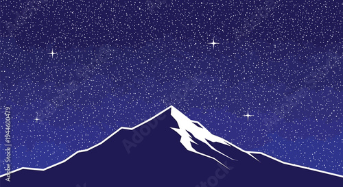 Majestic mountain peak illuminated under a vast starry night sky