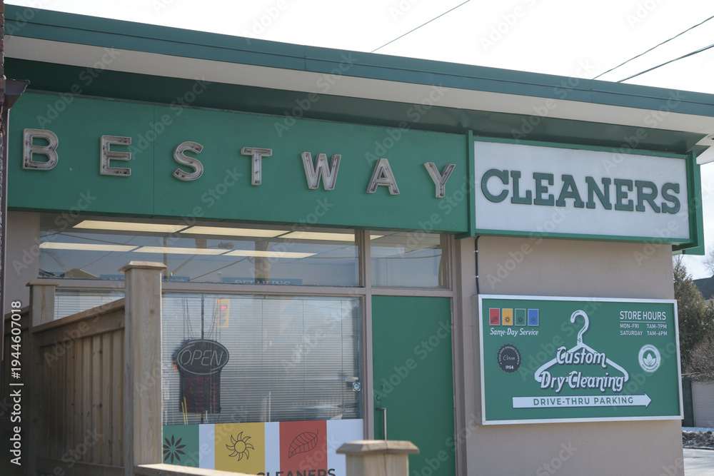 Fototapeta premium exterior building and sign of Bestway Donlands Cleaners at 249 Donlands Av, East York, Toronto