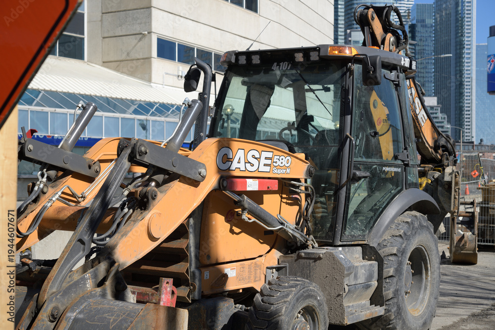 Fototapeta premium CASE 580 Super N, a 97-hp Tier 4 Final backhoe loader featuring a 17' 11