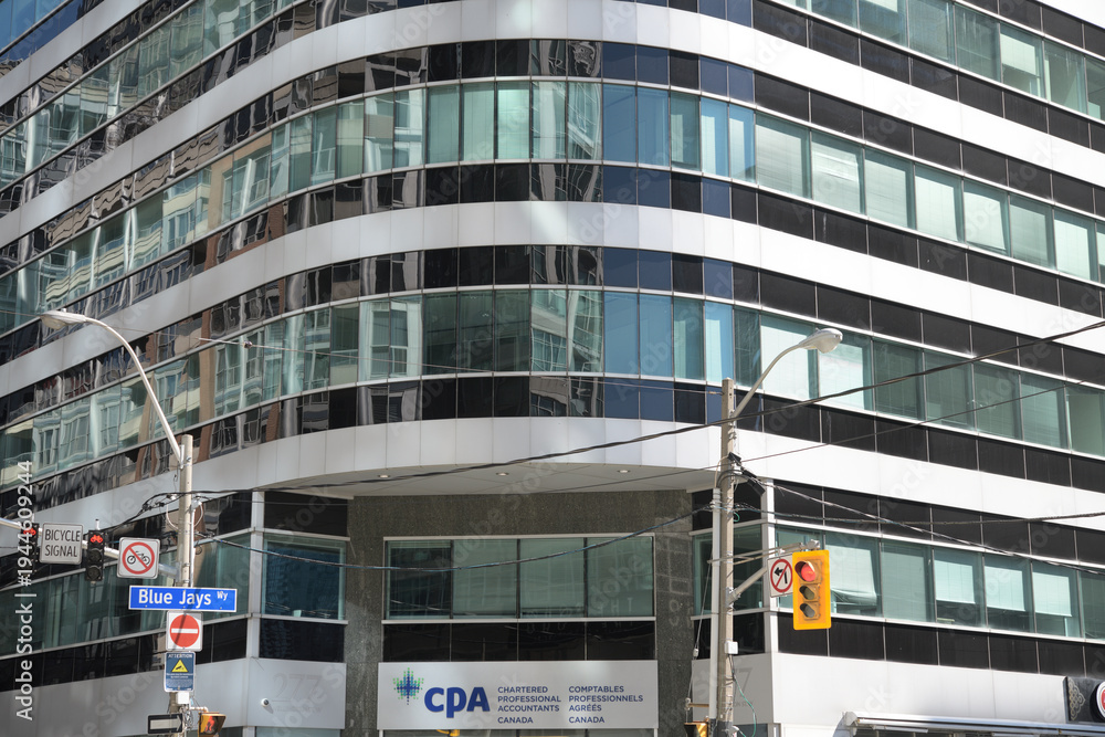 Obraz premium exterior building facade and sign of Chartered Professional Accountants of Canada, 145 King St W, Toronto