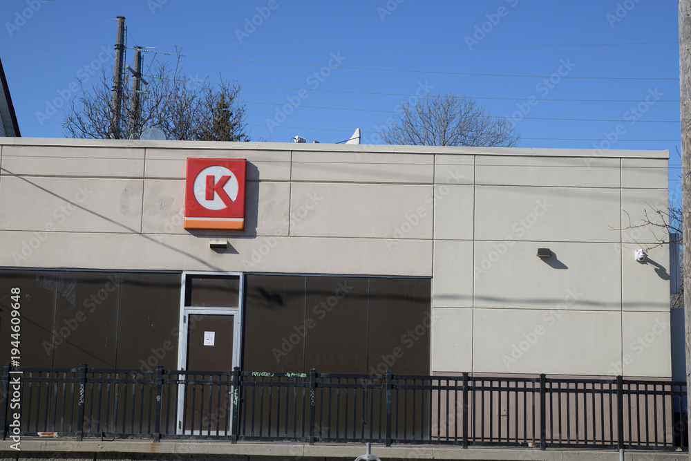 Naklejka premium logo sign on the exterior of Circle K, a convenience store chain, located here at 150 Dupont St, Toronto
