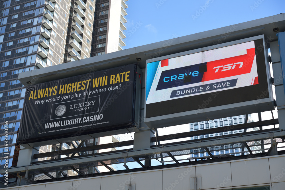 Fototapeta premium rooftop billboards for Luxury Casino and Crave/TSN streaming service atop 247 Yonge St, Toronto