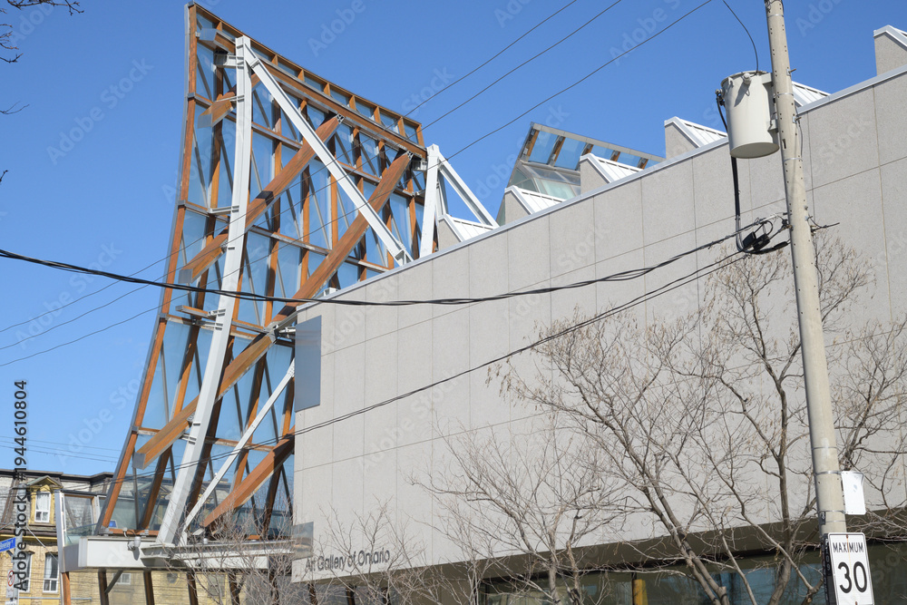 Fototapeta premium west edge of the Art Gallery of Ontario, 317 Dundas St W at Beverley with laminated wood and steel structure by Frank Gehry, Toronto