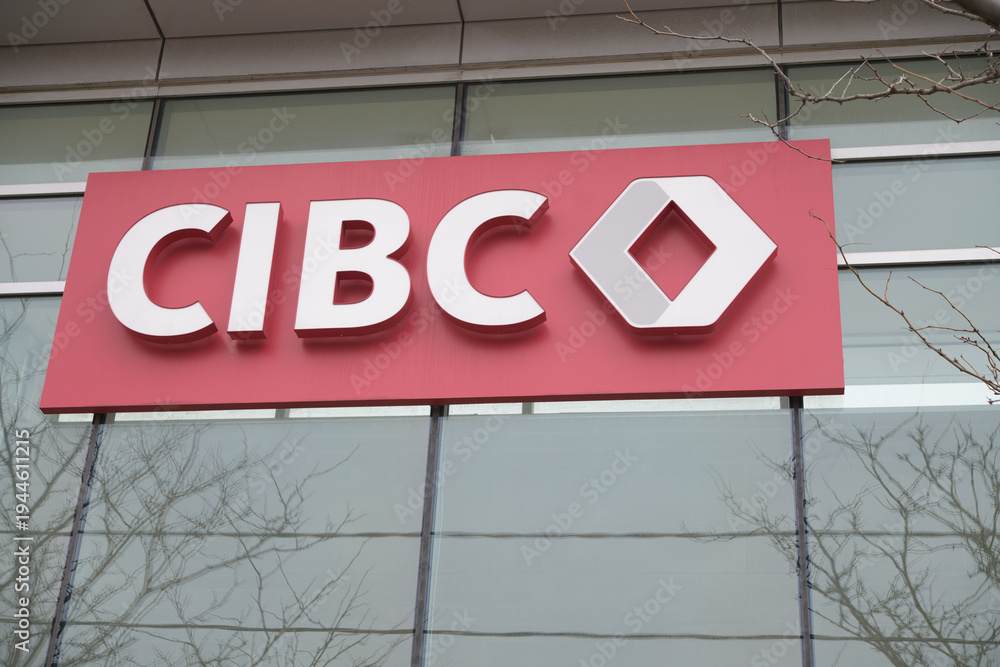Obraz premium exterior building facade and corporate logo sign and branch of CIBC located here at 97 Laird Dr, Toronto