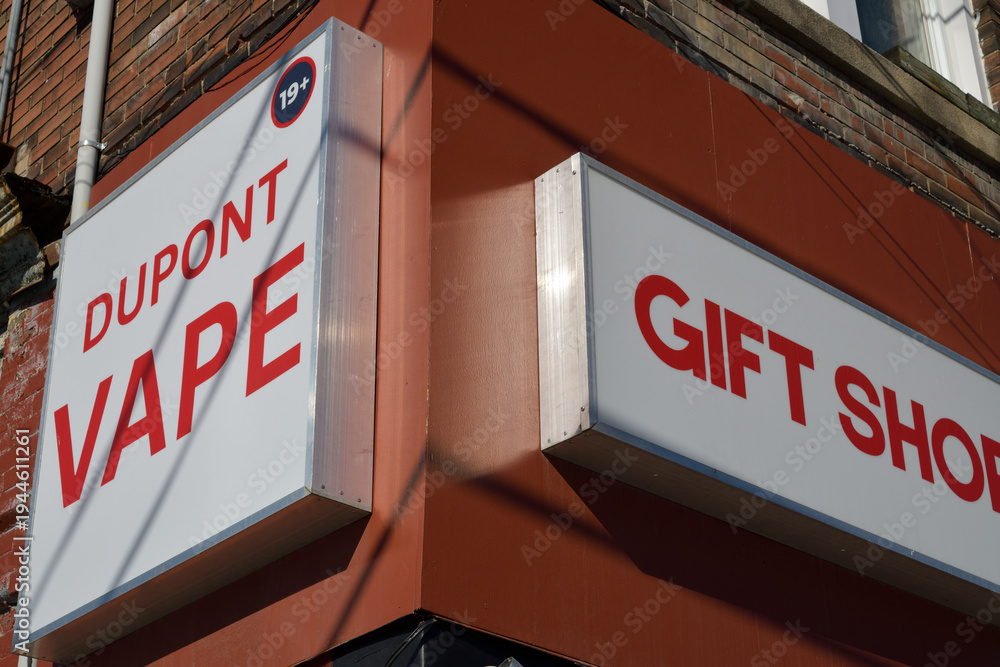 Fototapeta premium illuminated light-box signs at Dupont Vape Store located at 272 Dupont St, Toronto