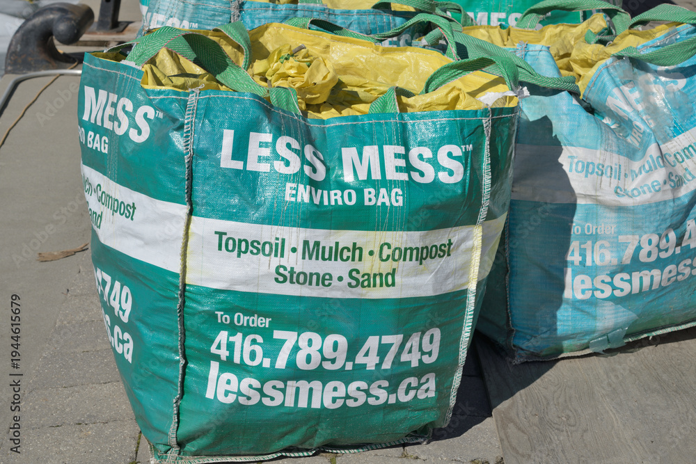 Naklejka premium large bags filled with material in Toronto (Less Mess Enviro Bag)