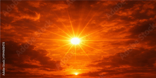 A dramatic sunset sky filled with beautiful orange and red clouds captures the natural beauty of sunlight during a golden evening landscape