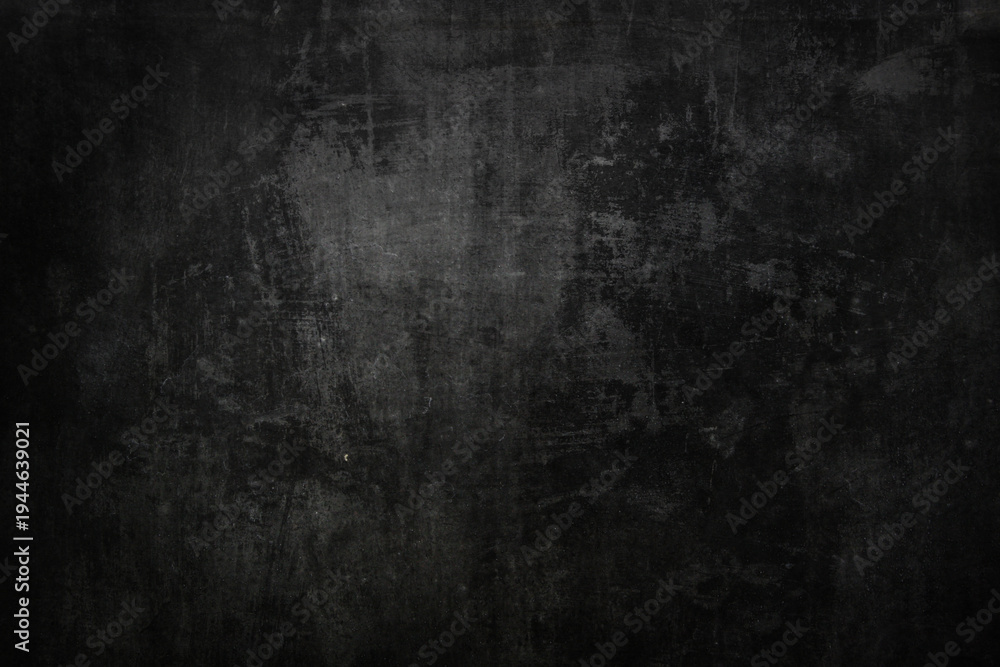 Fototapeta premium A dark aged concrete wall background with a dirty grunge texture on an empty rough surface featuring an old black vintage pattern for wallpaper design
