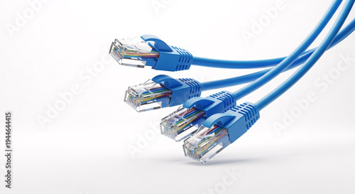 Four network Ethernet cables with clear connectors are suspended in a dynamic arrangement