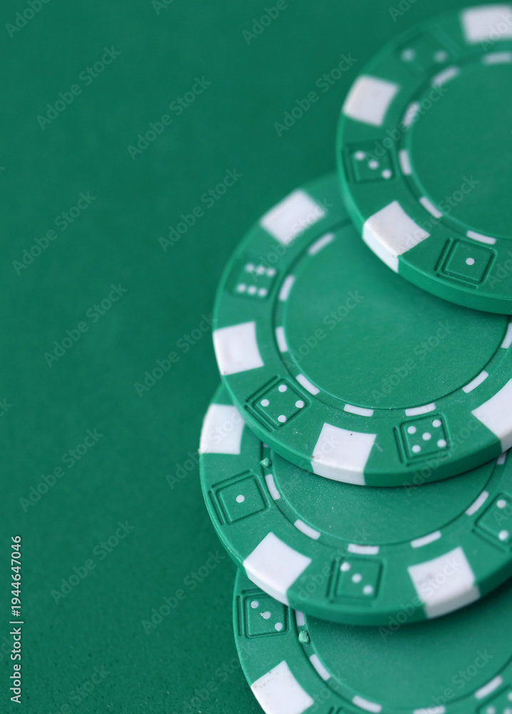 custom made wallpaper toronto digitalGreen casino poker chips on green gaming table close up. Few amount of green casino chips