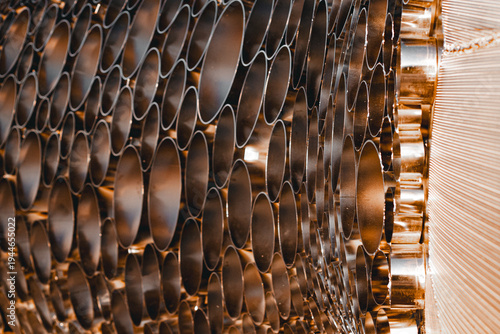 Abstract Industrial Metal Pipe Pattern with Warm Golden Reflections